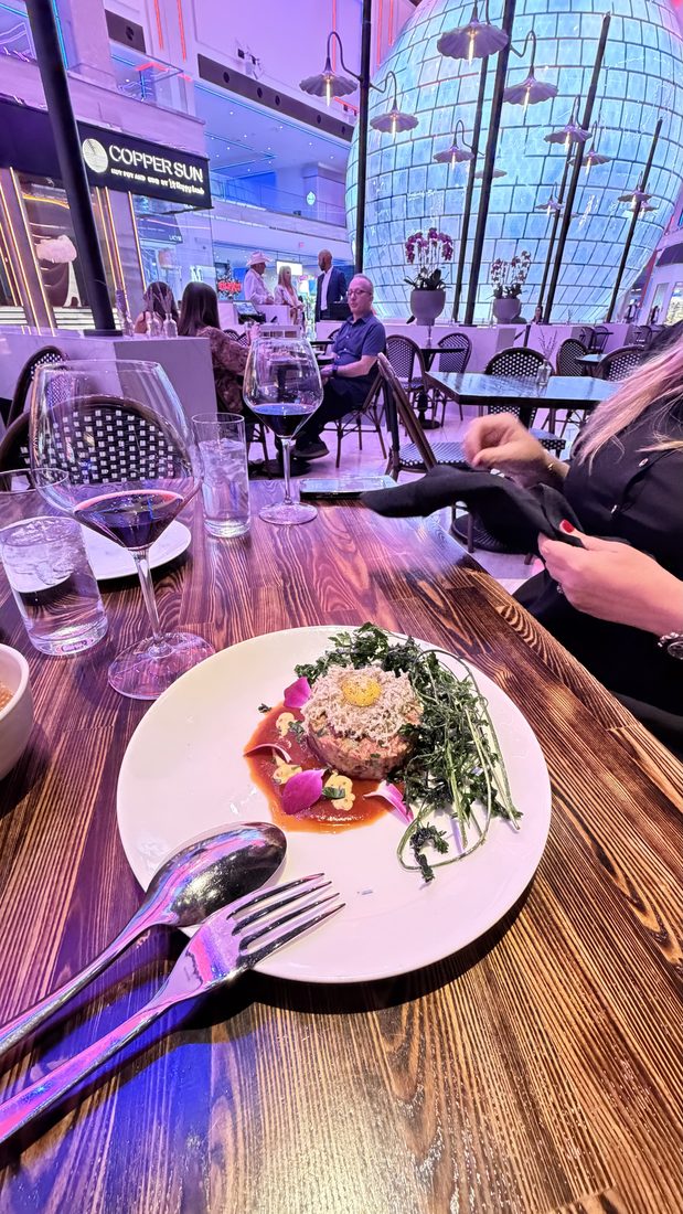 A plated dish with the Strip through the windows