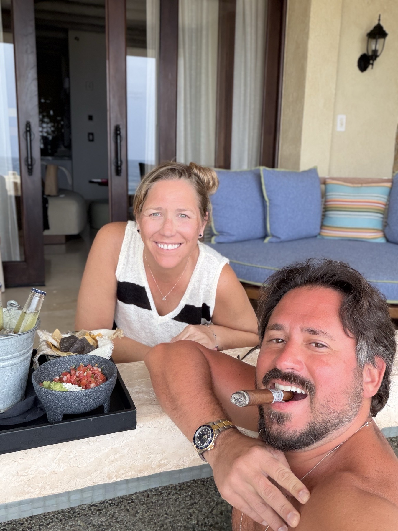 Guacamole and drinks on the terrace at dusk